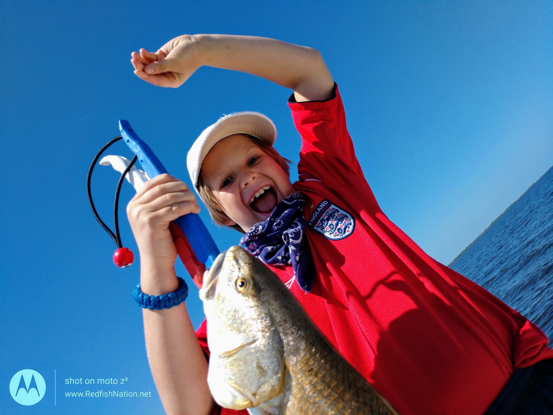 Guided Louisiana Fishing Charter - Redfish Nation - Redfish Catch on Water